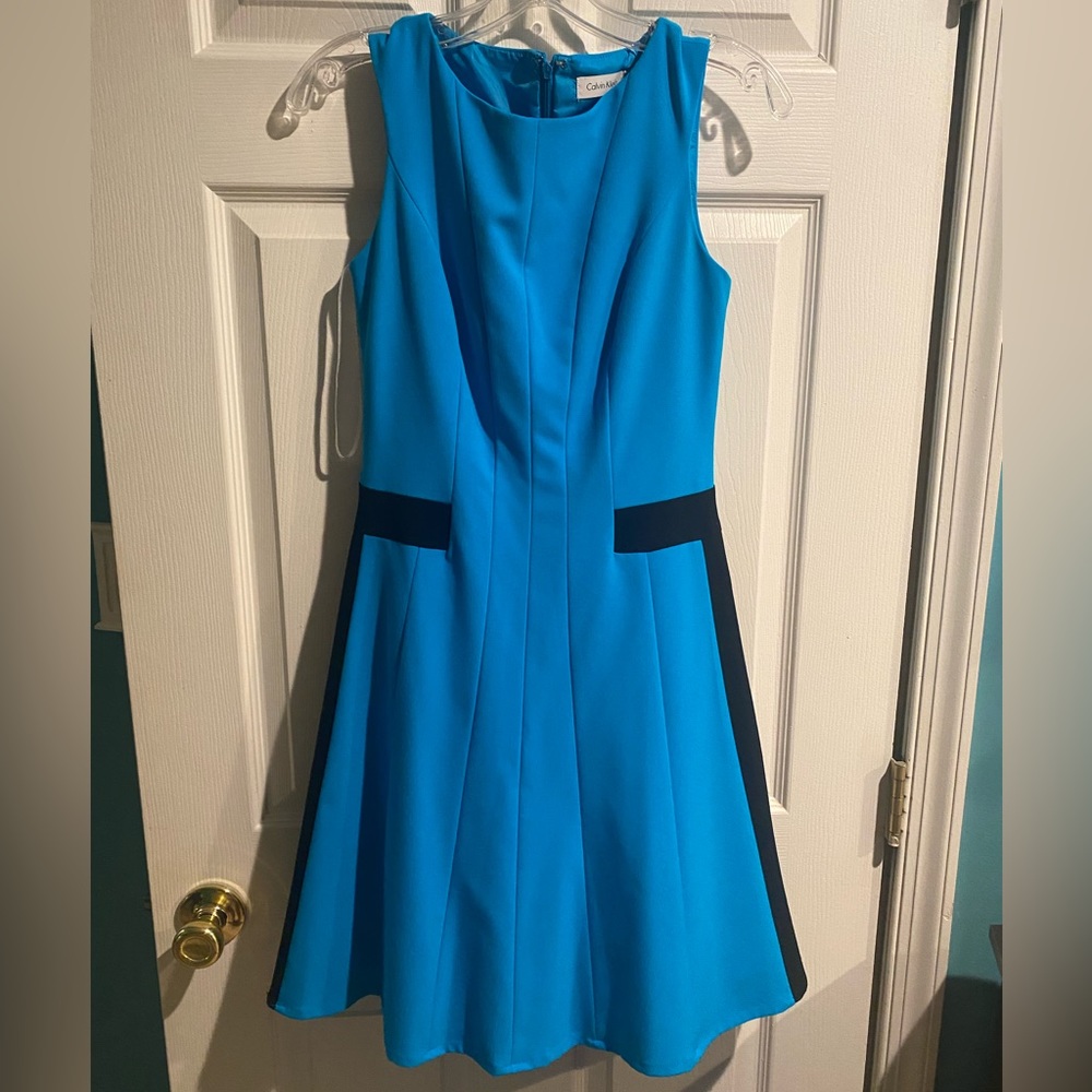 Calvin Klein Never been worn turquoise blue size 2P dress. All occasions!!